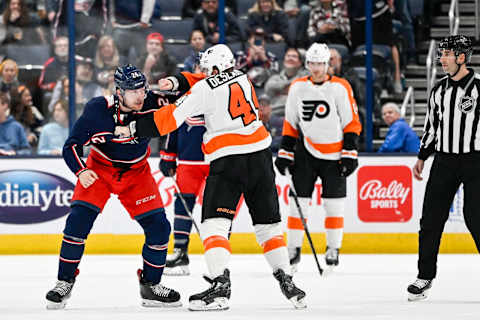 Nov 10, 2022; Columbus, Ohio, USA; Columbus Blue Jackets right wing Mathieu Olivier (24) and Philadelphia Flyers left wing Nicolas Deslauriers (44) fight during the first period at Nationwide Arena. Mandatory Credit: Gaelen Morse-USA TODAY Sports