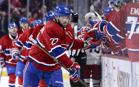 Jan 26, 2016; Montreal, Quebec, CAN; Montreal Canadiens forward Alex Galchenyuk (27) celebrates with teammates after scoring a goal against the Columbus Blue Jackets during the third period at the Bell Centre. Mandatory Credit: Eric Bolte-USA TODAY Sports