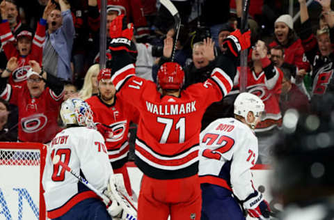 RALEIGH, NC – DECEMBER 28: Lucas Wallmark #71 of the Carolina Hurricanes celebrates after scoring a goal during an NHL game against the Washington Capitals on December 28, 2019 at PNC Arena in Raleigh, North Carolina. (Photo by Gregg Forwerck/NHLI via Getty Images)