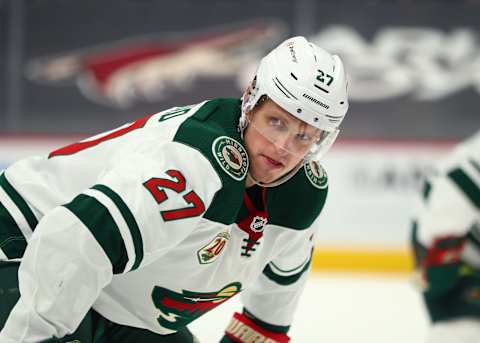 Mar 5, 2021; Glendale, Arizona, USA; Minnesota Wild center Nick Bjugstad (27) against the Arizona Coyotes at Gila River Arena. Mandatory Credit: Mark J. Rebilas-USA TODAY Sports