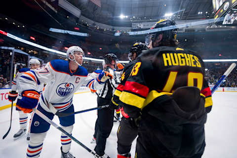 Nov 6, 2023; Vancouver, British Columbia, CAN; Edmonton Oilers forward Connor McDavid (97) argues with Vancouver Canucks defenseman Quinn Hughes (43) after a scrum in the third period at Rogers Arena. Vancouver won 6-2. Mandatory Credit: Bob Frid-USA TODAY Sports