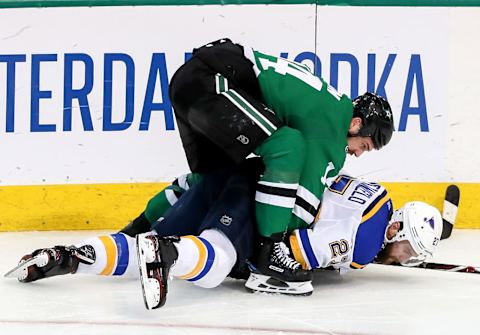 DALLAS, TX – MAY 01: Dallas Stars left winger Jamie Benn (14) lays on top of St Louis Blues defenseman Alex Pietrangelo (27) during game 4 of the second round of the Stanley Cup Playoffs between the St. Louis Blues and the Dallas Stars on May 1, 2019 at American Airlines Center in Dallas, TX. (Photo by Steve Nurenberg/Icon Sportswire via Getty Images)