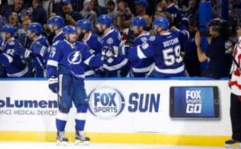 Tampa Bay Lightning left wing Alex Killorn (17) is congratulated after scoring a goal in Lightning blue (Kim Klement-USA TODAY Sports)