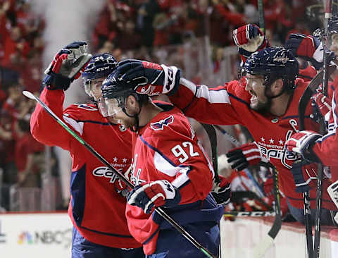 WASHINGTON, DC – APRIL 24: Evgeny Kuznetsov #92 of the Washington Capitals scores at 13:22 of the second period as Alex Ovechkin #8 of the Washington Capitals congratulates him during the game against the Carolina Hurricanes in Game Seven of the Eastern Conference First Round during the 2019 NHL Stanley Cup Playoffs at the Capital One Arena on April 24, 2019 in Washington, DC. (Photo by Patrick Smith/Getty Images)