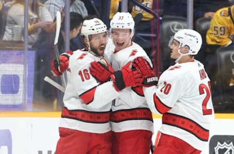 NASHVILLE, TENNESSEE – MAY 21: Vincent Trocheck #16 of the Carolina Hurricanes celebrates with Andrei Svechnikov #37 and Sebastian Aho #20 after scoring a goal in the second period against the Nashville Predators in Game Three of the First Round of the 2021 Stanley Cup Playoffs at Bridgestone Arena on May 21, 2021, in Nashville, Tennessee. (Photo by Andy Lyons/Getty Images)