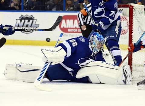 Jan 19, 2016; Tampa, FL, USA; Tampa Bay Lightning goalie Andrei Vasilevskiy (88) makes a save against the Edmonton Oilers during the first period at Amalie Arena. Mandatory Credit: Kim Klement-USA TODAY Sports