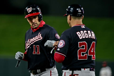 Oct 11, 2019; St. Louis, MO, USA; Washington Nationals first baseman Ryan Zimmerman (11) celebrates with Washington Nationals first base coach Tim Bogar after a single during the third inning against the St. Louis Cardinals in game one of the 2019 NLCS playoff baseball series at Busch Stadium. Mandatory Credit: Jeff Curry-USA TODAY Sports