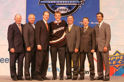 LOS ANGELES, CA – JUNE 25: Cam Fowler, drafted 12th overall by the Anaheim Ducks, poses on stage with team personnel during the 2010 NHL Entry Draft at Staples Center on June 25, 2010, in Los Angeles, California. (Photo by Bruce Bennett/Getty Images)