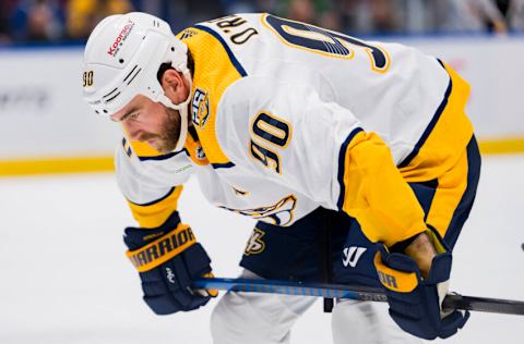 Oct 31, 2023; Vancouver, British Columbia, CAN; Nashville Predators forward Ryan O'Reilly (90) prepares for a face off against the Nashville Predators in the second period at Rogers Arena. Mandatory Credit: Bob Frid-USA TODAY Sports