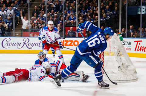 TORONTO, ON – DECEMBER 22: Mitch Marner #16 of the Toronto Maple Leafs scores a goal against Alexandar Georgiev #40 of the New York Rangers during the third period at the Scotiabank Arena on December 22, 2018 in Toronto, Ontario, Canada. (Photo by Mark Blinch/NHLI via Getty Images)