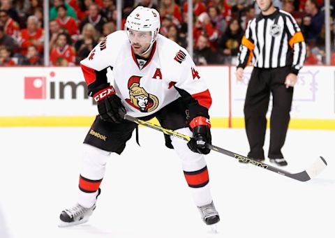 CHICAGO, IL – OCTOBER 26: Chris Phillips #4 of the Ottawa Senators plays in the game against the Chicago Blackhawks at the United Center on October 26, 2014 in Chicago, Illinois. (Photo by Steve Woltmann/NHLI via Getty Images)