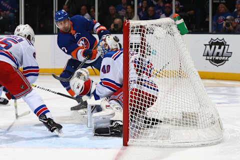 Jordan Eberle #7 of the New York Islanders takes a shot against Alexandar Georgiev #40 of the New York Rangers