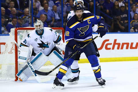 May 23, 2016; St. Louis, MO, USA; San Jose Sharks goalie Martin Jones (31) looks around the screen of St. Louis Blues center David Backes (42) during the first period in game five of the Western Conference Final of the 2016 Stanley Cup Playoffs at Scottrade Center. The Sharks won the game 6-3. Mandatory Credit: Billy Hurst-USA TODAY Sports