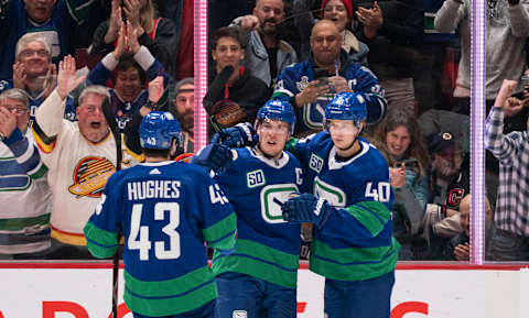 Vancouver Canucks celebrate a goal. (Photo by Rich Lam/Getty Images)