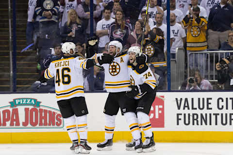 COLUMBUS, OH – MAY 06: Boston Bruins right wing David Backes (42) celebrates with Boston Bruins left wing Jake DeBrusk (74) and Boston Bruins center David Krejci (46) after scoring a goal in the Stanley Cup Eastern Conference semifinal playoff game between the Columbus Blue Jackets and the Boston Bruins on May 06, 2019 at Nationwide Arena in Columbus, OH. (Photo by Adam Lacy/Icon Sportswire via Getty Images)