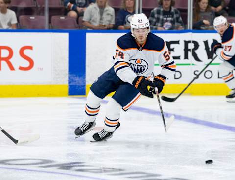 PENTICTON, BC – SEPTEMBER 16: Xavier Bourgault #54 of the Edmonton Oilers skates with the puck during first period against the Winnipeg Jets at the South Okanagan Event Centre during the 2022 Young Stars Tournament on September 16, 2022 in Penticton, Canada. (Photo by Marissa Baecker / Getty Images)