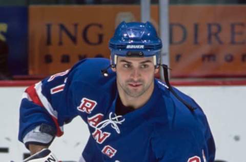 Rico Fata #21, Left Wing for the New York Rangers in motion on the ice during the NHL Western Conference Northwest Division game against the Calgary Flames on 14th November 2002 at the Pengrowth Saddledome in Calgary, Canada. The New York Rangers won the game 2 – 1. (Photo by Ian Tomlinson/Getty Images)