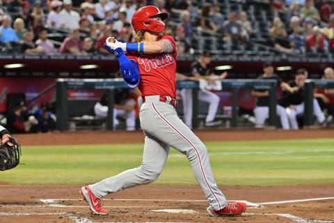 Jun 15, 2023; Phoenix, Arizona, USA; Philadelphia Phillies second baseman Bryson Stott (5) hits a solo home run in the second inning against the Arizona Diamondbacks at Chase Field. Mandatory Credit: Matt Kartozian-USA TODAY Sports