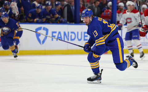 Mar 27, 2023; Buffalo, New York, USA; Buffalo Sabres right wing Lukas Rousek (13) skates for a loose puck during the second period against the Montreal Canadiens at KeyBank Center. Mandatory Credit: Timothy T. Ludwig-USA TODAY Sports