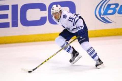 Dec 5, 2015; St. Louis, MO, USA; Toronto Maple Leafs right wing P.A. Parenteau (15) skates with the puck during a game against the St. Louis Blues at Scottrade Center. Toronto won the game 4-1. Mandatory Credit: Billy Hurst-USA TODAY Sports