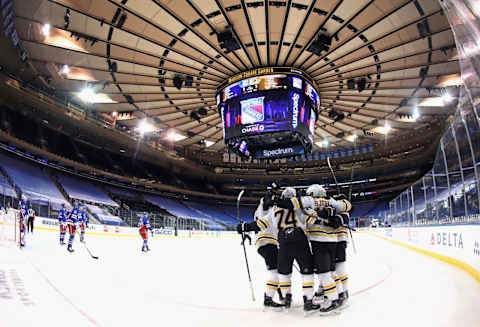 The Boston Bruins celebrate a goal. (Photo by Bruce Bennett/Getty Images)