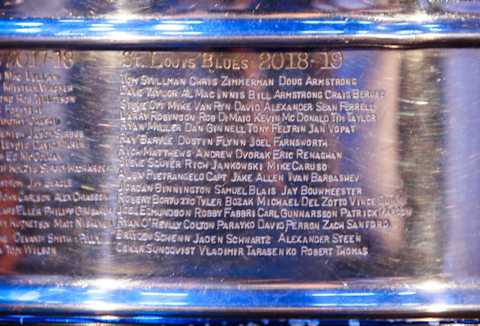 The names of the St. Louis Blue championship team engraved on the Stanley Cup.Tstanley Cup00272