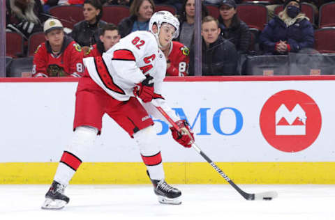 CHICAGO, ILLINOIS – NOVEMBER 03: Jesperi Kotkaniemi #82 of the Carolina Hurricanes controls the puck during a game against the Chicago Blackhawks at United Center on November 03, 2021,  in Chicago, Illinois. (Photo by Stacy Revere/Getty Images)