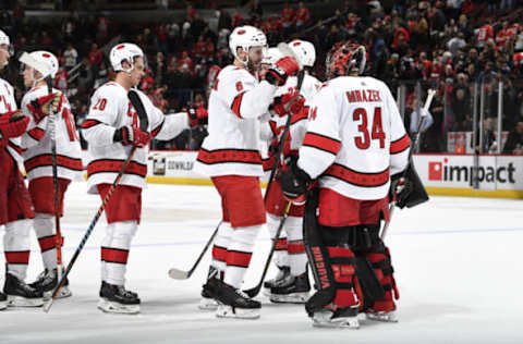 CHICAGO, IL – NOVEMBER 19: The Carolina Hurricanes celebrate after defeating the Chicago Blackhawks 4-2 at the United Center on November 19, 2019 in Chicago, Illinois. (Photo by Bill Smith/NHLI via Getty Images)