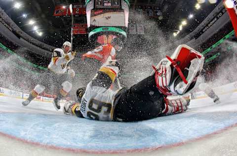 PHILADELPHIA, PA – MARCH 12: Marc-Andre Fleury #29 of the Vegas Golden Knights slides across his crease as Colin Miller #6 defends against Claude Giroux #28 of the Philadelphia Flyers on March 12, 2018, at the Wells Fargo Center in Philadelphia, Pennsylvania. The Golden Knights went on to defeat the Flyers 3-2. Tonight’s win was the 400th in Fleury’s NHL career. (Photo by Len Redkoles/NHLI via Getty Images)