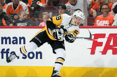 PHILADELPHIA, PA – APRIL 15: Jake Guentzel #59 of the Pittsburgh Penguins takes a slapshot against the Philadelphia Flyers in Game Three of the Eastern Conference First Round during the 2018 NHL Stanley Cup Playoffs at the Wells Fargo Center on April 15, 2018 in Philadelphia, Pennsylvania. (Photo by Len Redkoles/NHLI via Getty Images)