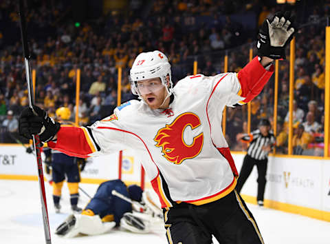 Mar 23, 2017; Nashville, TN, USA; Calgary Flames defenseman Dougie Hamilton (27) celebrates after a goal during the second period against the Nashville Predators at Bridgestone Arena. Mandatory Credit: Christopher Hanewinckel-USA TODAY Sports