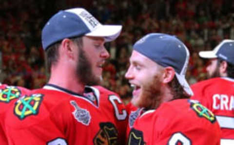 Jun 15, 2015; Chicago, IL, USA; Chicago Blackhawks center Jonathan Toews (19) celebrates with right wing Patrick Kane (88) after defeating the Tampa Bay Lightning in game six of the 2015 Stanley Cup Final at United Center. Mandatory Credit: Dennis Wierzbicki-USA TODAY Sports