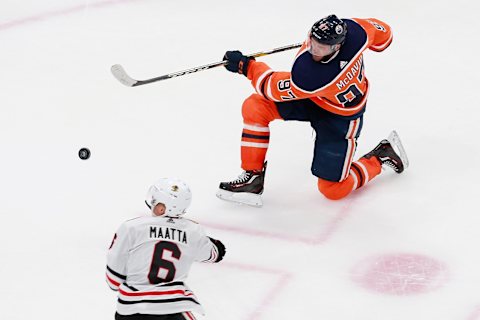 EDMONTON, ALBERTA – AUGUST 03: Connor McDavid #97 of the Edmonton Oilers shoots the puck in Game Two of the Western Conference Qualification Round against the Chicago Blackhawks prior to the 2020 NHL Stanley Cup Playoffs at Rogers Place on August 03, 2020 in Edmonton, Alberta. (Photo by Jeff Vinnick/Getty Images)