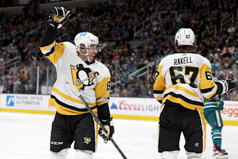 SAN JOSE, CALIFORNIA – FEBRUARY 14: Sidney Crosby #87 of the Pittsburgh Penguins celebrates after Rickard Rakell #67 scored a goal against the San Jose Sharks in the first period at SAP Center on February 14, 2023 in San Jose, California. (Photo by Ezra Shaw/Getty Images)