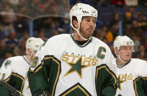 ST. LOUIS – DECEMBER 26: Center Mike Modano #9 of the Dallas Stars looks on against the St. Louis Blues on December 26, 2005 at the Savvis Center in St. Louis, Missouri. The Stars defeated Blues 6-1. (Photo by Elsa/Getty Images)