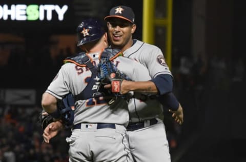 SAN FRANCISCO, CA – AUGUST 06: Max Stassi #12 and Hector Rondon #30 of the Houston Astros celebrates defeating the San Francisco Giants 3-1 at AT&T Park on August 6, 2018 in San Francisco, California. (Photo by Thearon W. Henderson/Getty Images)