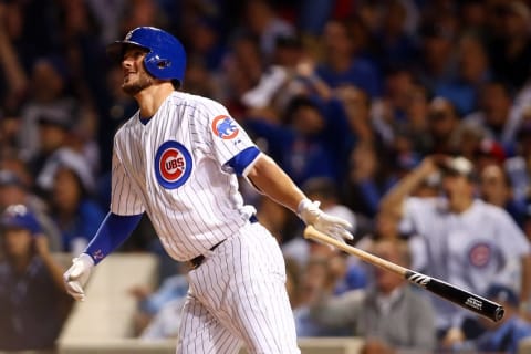 Oct 12, 2015; Chicago, IL, USA; Chicago Cubs third baseman Kris Bryant (17) hits a two run home run during the fifth inning against the St. Louis Cardinals in game three of the NLDS at Wrigley Field. Mandatory Credit: Jerry Lai-USA TODAY Sports