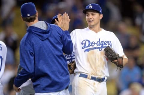 Oct 18, 2016; Los Angeles, CA, USA; Los Angeles Dodgers shortstop Corey Seager (5) and starting pitcher Rich Hill (44) celebrate beating the Chicago Cubs in game three of the 2016 NLCS playoff baseball series at Dodger Stadium. Mandatory Credit: Gary A. Vasquez-USA TODAY Sports. Fantasy Baseball.