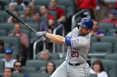 May 3, 2017; Atlanta, GA, USA; New York Mets second baseman Neil Walker (20) hits an RBI double scoring shortstop Asdrubal Cabrera (not pictured) in the first inning of their game against the Atlanta Braves at SunTrust Park. Mandatory Credit: Jason Getz-USA TODAY Sports