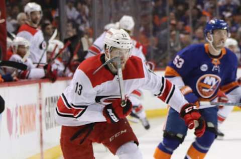 NEW YORK, NEW YORK – APRIL 28: Warren Foegele #13 of the Carolina Hurricanes skates against the New York Islanders in Game Two of the Eastern Conference Second Round during the 2019 NHL Stanley Cup Playoffs at the Barclays Center on April 28, 2019 in the Brooklyn borough of New York City. The Hurricanes defeated the Islanders 2-1. (Photo by Bruce Bennett/Getty Images)