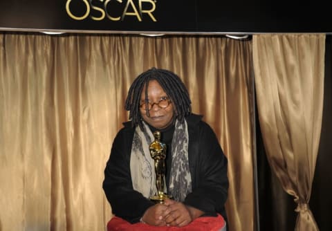 Whoopi Goldberg with her Oscar.