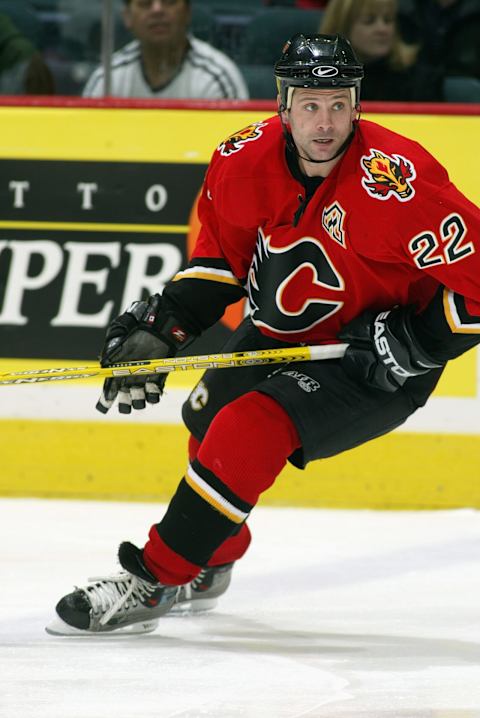 CALGARY, AB – NOVEMBER 20: Center Craig Conroy #22 of the Calgary Flames skates on the ice during the game against the Montreal Canadians at Pengrowth Saddledome on November 20, 2003 in Calgary, Alberta. The Flames won 2-1. (Photo by Ian Tomlinson/Getty Images)