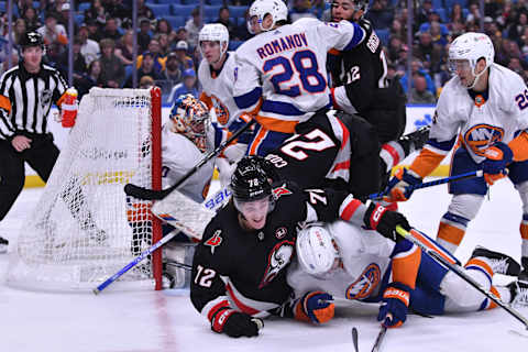 Oct 21, 2023; Buffalo, New York, USA; Buffalo Sabres right wing Tage Thompson (72) and New York Islanders defenseman Ryan Pulock (6) are in a pile of players near the goal in the second period at KeyBank Center. Mandatory Credit: Mark Konezny-USA TODAY Sports