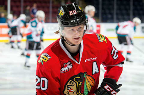 KELOWNA, BC – MARCH 03: Joachim Blichfeld #20 of the Portland Winterhawks stands at the bench during warm up against the Kelowna Rockets at Prospera Place on March 3, 2019 in Kelowna, Canada. (Photo by Marissa Baecker/Getty Images)