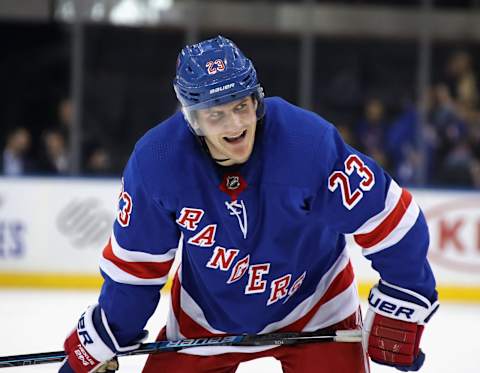 NEW YORK, NEW YORK – SEPTEMBER 24: Adam Fox #23 of the New York Rangers pauses between shifts against the New York Islanders at Madison Square Garden on September 24, 2019 in New York City. (Photo by Bruce Bennett/Getty Images)