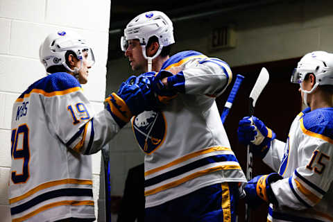 RALEIGH, NC – DECEMBER 02: Peyton Krebs #19 of the Buffalo Sabres and Mattias Samuelsson #23 of the Buffalo Sabres prep before the second period of the game against the Carolina Hurricanes at PNC Arena on December 02, 2023 in Raleigh, North Carolina. (Photo by Jaylynn Nash/Getty Images)