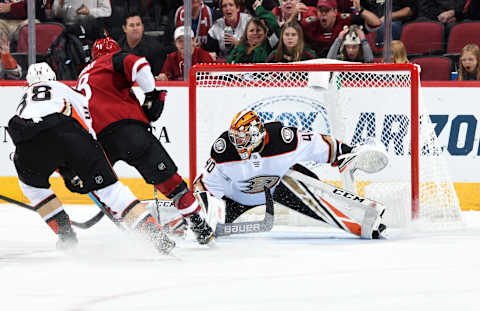 GLENDALE, ARIZONA – SEPTEMBER 21: Goalie Kevin Boyle #40 of the Anaheim Ducks makes a save on the shot by Christian Dvorak #18 of the Arizona Coyotes as Derek Grant #38 of the Ducks defends during the third period of an NHL preseason game at Gila River Arena on September 21, 2019 in Glendale, Arizona. (Photo by Norm Hall/NHLI via Getty Images)