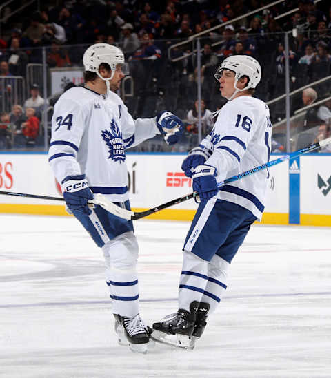 ELMONT, NEW YORK – MARCH 21: Mitchell Marner #16 of the Toronto Maple Leafs (L) (Photo by Bruce Bennett/Getty Images)