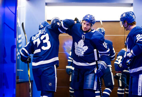 TORONTO, ON – APRIL 15: Zach Hyman #11 and Travis Dermott #23 of the Toronto Maple Leafs in the dressing room ahead of playing the Boston Bruins in Game Three of the Eastern Conference First Round during the 2019 NHL Stanley Cup Playoffs at the Scotiabank Arena on April 15, 2019 in Toronto, Ontario, Canada. (Photo by Mark Blinch/NHLI via Getty Images)