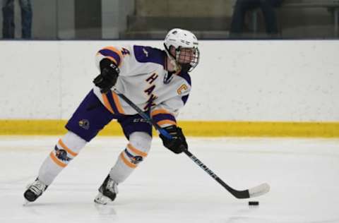 PRIOR LAKE, MN – DEC 29: Chaska Hawks defenseman Michael Koster carries the puck against the Edina Hornets during their prep hockey game at Dakotah! Ice Arena in Prior Lake, MN on Saturday, December, 29, 2018.(Photo by Josh Holmberg/Icon Sportswire via Getty Images)